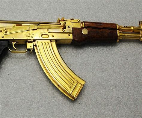 Versace gold plated AK purchased for ,000. 